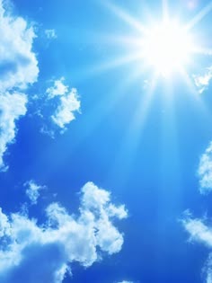 This may contain: the sun shines brightly through some clouds